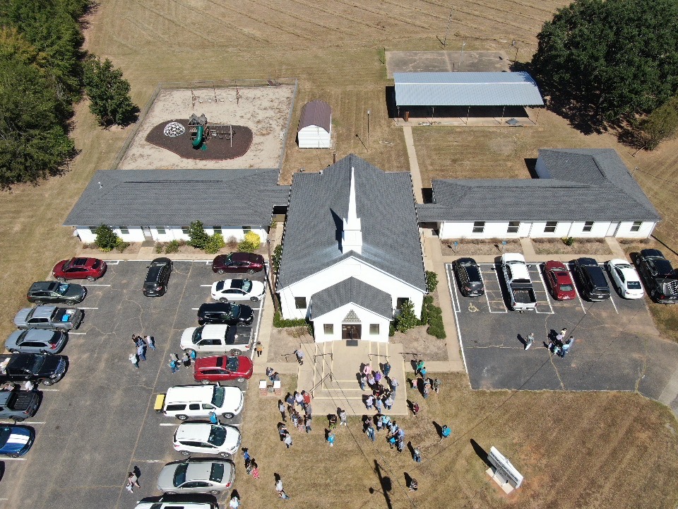 Church family arriving for Sunday worship at First Baptist Laneville